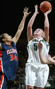 Michigan State's Laura Hall, right, shoots against Illinois' Erin Wigley (34) during the first half. (AP Photo/Al Goldis)
