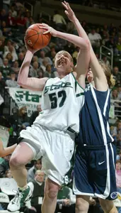 Liz Shimek (52) puts up a shot against Penn State's Romana Vynuchalova. (AP Photo)