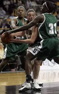 Michigan State defenders Aisha Jefferson (22) and Victoria Lucas-Perry team up on Iowa's Abby Emmert, in the first half. (AP Photo/The City Press-Citizen, Matthew Holst)