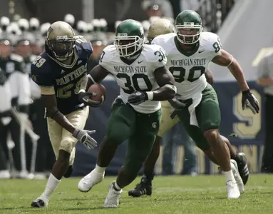 Jehuu Caulcrick and the Spartans look to reestablish the running game against Northwestern.