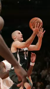 Drew Neitzel puts up the game-winning shot in a 63-61 victory over Texas.
