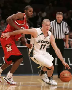 Drew Neitzel drives past Maryland's D.J. Strawberry during the second half. (AP photo)