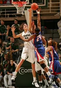 Allyssa DeHaan redirects one of her school-record eight blocked shots in MSU's 65-49 win over UT Arlington on Sunday.