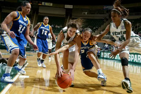 Allyssa DeHaan fights for a loose ball in the second half.