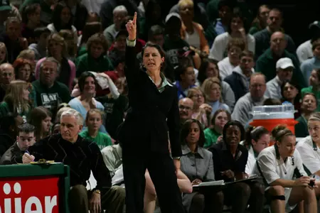 Joanne P. McCallie and the rest of the Spartans are looking for Spartan fans to "Bust The Bus" this Sunday to get a free ticket to the Big Ten opener against Indiana.