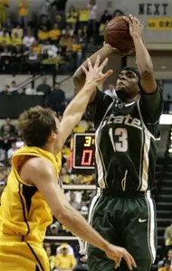 Maurice Ager shoots against Iowa guard Adam Haluska in the second half.
