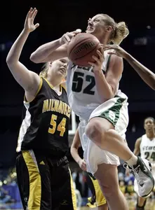 Liz Shimek heads to the basket past Wisconsin-Milwaukee defender Traci Edwards during the second half.