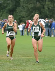 Senior Michelle Rafferty and sophomore Lisa Senakiewich paced a successful athletic and academic 2005 season for the Green and White.