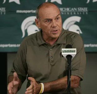 Fourth-year MSU head coach John L. Smith responds to questions during the Aug. 7 Media Day press conference.