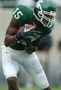 Kerry Reed pulls in a 27-yard touchdown reception against Idaho during the first quarter.
