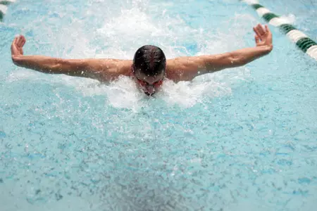 Senior Adam Schmitt won the 50 free and 200 IM against Iowa Friday night