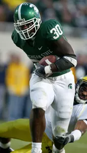 Jehuu Caulcrick scored two touchdowns against Michigan on Saturday.