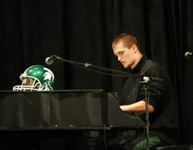 Jon Misch wows the crowd with his impressive performance on the piano Thursday afternoon at the Champs Sports Bowl Kickoff Luncheon.