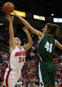 Ohio State's Stephanie Blanton has her shot blocked by Allyssa DeHaan during the first half.