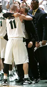 Spartan head coach Tom Izzo hugs Drew Nietzel as he leaves the game Tuesday evening. Nietzel lead the Spartans with a game high 28 points, shooting 10-17 from the field and 6-11 from beyond the arch.