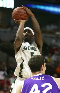 Travis Walton and the Spartans play Wisconsin in the Big Ten Tournament quarterfinals.
