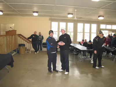 Ryan Brehm accepts his trophy after earning medalist honors at the Boilermaker Invitational.