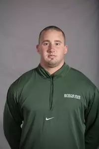 Kyle Strotbaum set a new school record on Friday night, with a distance of 18.05m (59ft-2.75in) in the weight throw.