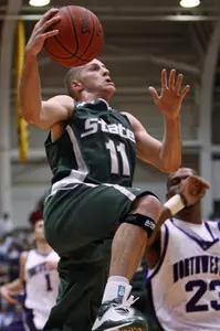 Drew Neitzel drives to the basket during the second half.