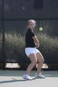 Elena Ivanova defeated Emese Kardhordo of Wisconsin, 6-2, 7-5.