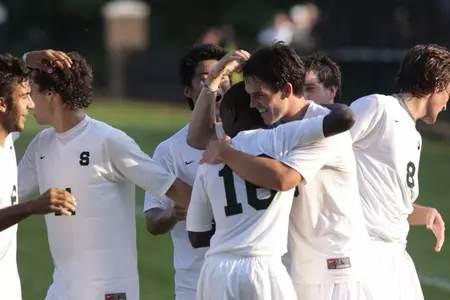 The Spartans celebrated their fifth win in their last six games over Michigan.