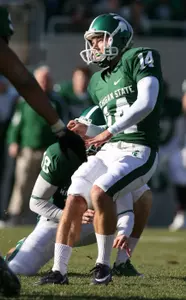 Brett Swenson watches his game-winning field goal with seven seconds remaining. (AP Photo/Al Goldis)