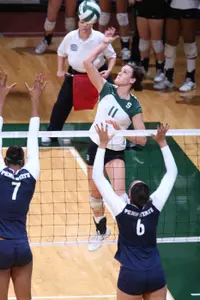 <i> Freshman Becca Zlabis was one of three Spartans to tally a team-high 12 kills.</i>