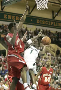 Kalin Lucas takes a shot over Maryland forward Landon Milbourne. (AP Photo/Reinhold Matay)
