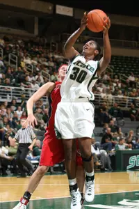 Redshirt freshman Lykendra Johnson poured in a game-high 23 points in tonight's 97-32 exhibition win over Saginaw Valley State.