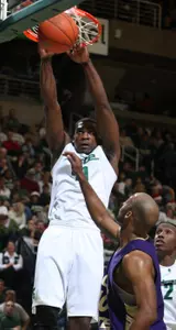 Michigan State's Marquise Gray, top, dunks over Alcorn State's Jumane Reed during the first half. (AP Photo/Al Goldis)