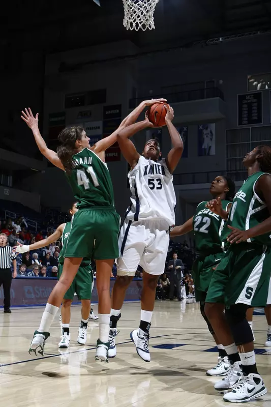 Junior Allyssa DeHaan had one of her single-game record nine blocks in today's 71-66 loss at Xavier.