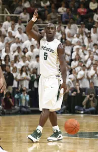 Senior Travis Walton will lead the Spartans against North Carolina at Ford Field.