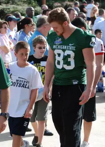 Charlie Gantt participates in the Day for Kids held on Sunday morning at Disney's Winter Summerland Miniature Golf.
