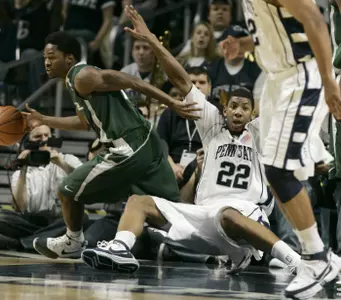 Penn State's Andrew Jones III, right, falls on his back after Michigan State's Kalin Lucas steals a rebound form him during the first half (AP Photo)