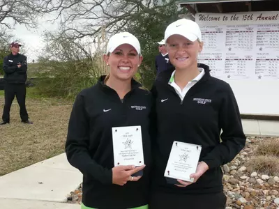 Senior Sara Brown (left) and freshman Aimee Neff finished one-two this afternoon at the "Mo"Morial Tournament.