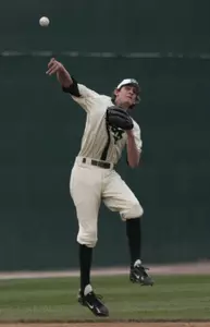 Freshman Jonathan Roof makes a great play at short during the Crosstown Showdown.