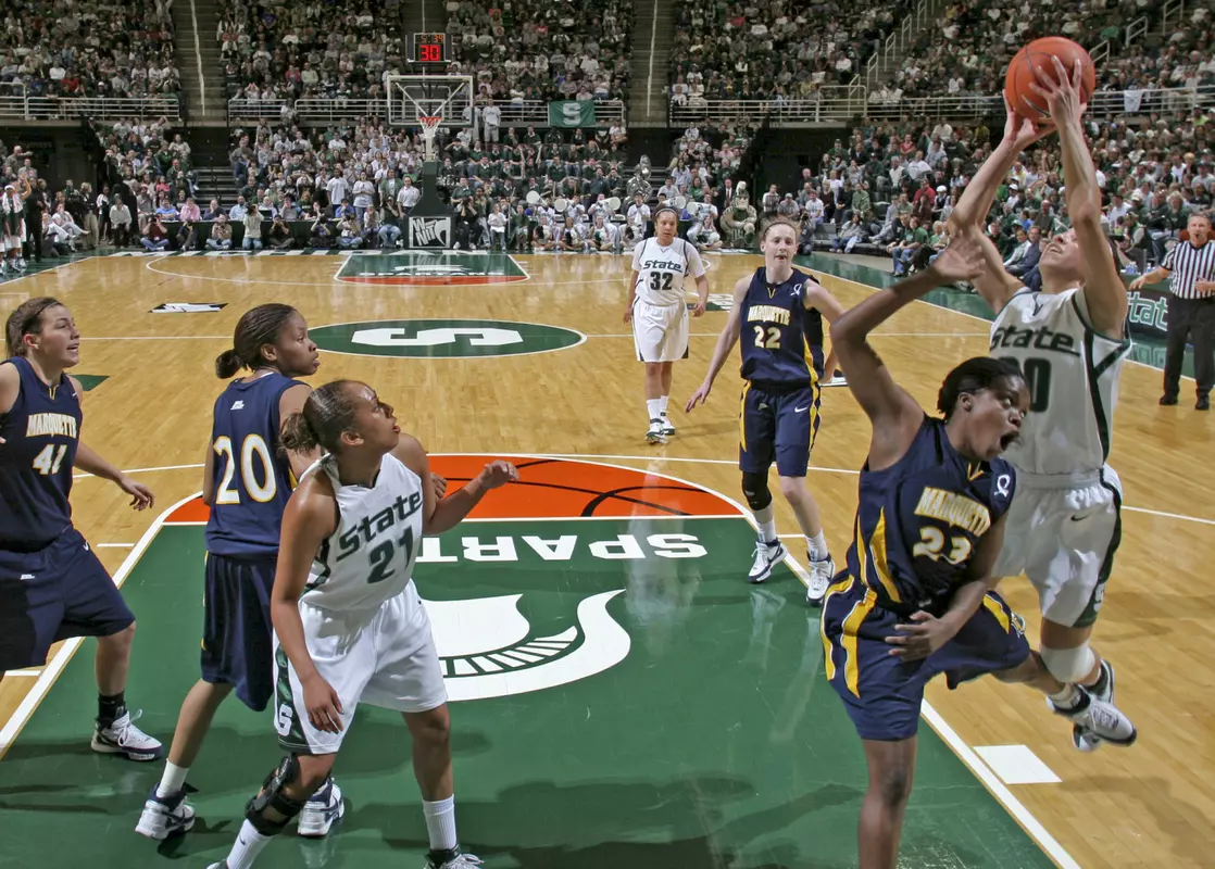 Brittney Thomas looks for a shot against Marquette Saturday in the WNIT championship game.