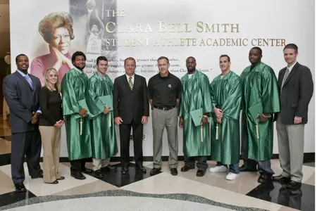 Group Photo: Elliott Daniels, Mandy Chandler, Devin Pritchett, Jacob Bishop, Mark Hollis, Mark Dantonio, Mike Bell, Rob Tabatchnick, Ogemdi Nwagbuo, Todd Edwards.