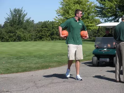 Men's basketball Goran Suton took time out of his day to provide fun for an array of golfers