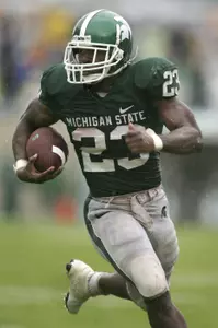 Michigan State's Javon Ringer runs for a 21-yard touchdown during the second quarter.