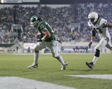 Jeff McPherson scores a pivotal touchdown against Penn State last year in the comeback victory over the Nittany Lions.