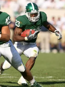 Javon Ringer rushes for a 7-yard gain during the second quarter. (AP Photo)