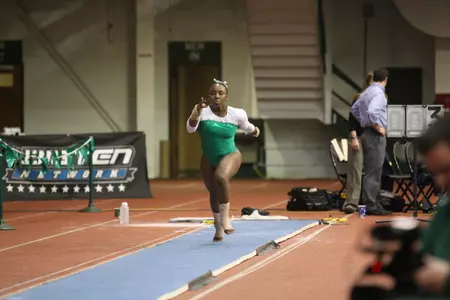 Junior Rochelle Robinson finished third overall on vault