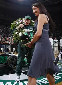 After arriving in the Winners Circle at Midnight Madness, Coach Izzo is greated by his wife.