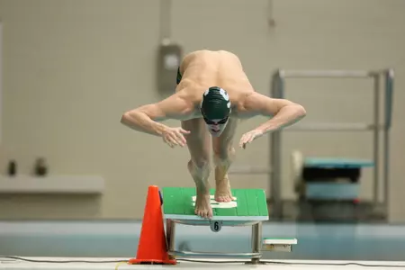 The men's and women's teams each defeated UW-Milwaukee on Friday night.