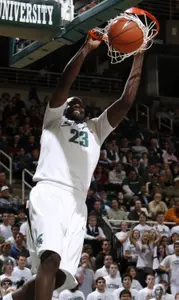 Michigan State's Draymond Green dunks during the first half of an NCAA college basketball game against Oakland Michigan on Thursday, Dec. 10, 2009, in East Lansing, Mich. (AP Photo/Al Goldis)
