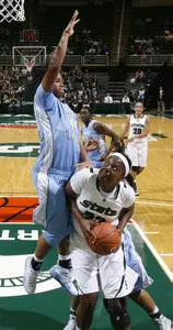 Michigan State's Aisha Jefferson, right, maneuvers for a shot and draws a foul from North Carolina's Tierra Ruffin-Pratt during the first half of an NCAA college basketball game Thursday, Dec. 3, 2009, in East Lansing, Mich. (AP Photo/Al Goldis)