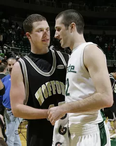 Michigan State's Isaiah Dahlman meets with his brother Noah, a forward for Wofford, after the Spartans' win. Brian Cripe/MSU Athletic Communications