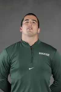 <i> Jay Gillespie broke his own school-record in the weight throw. </i>