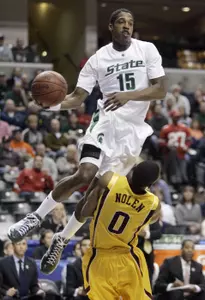 Durrell Summers jumps to make a pass against Minnesota.